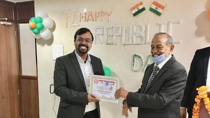 Dr. Umesh Kumar receiving a medical honour